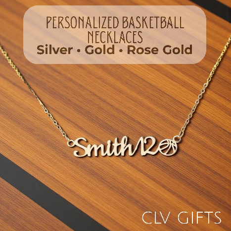 Personalized Smith12 necklace with a basketball motif on a wooden basketball court.