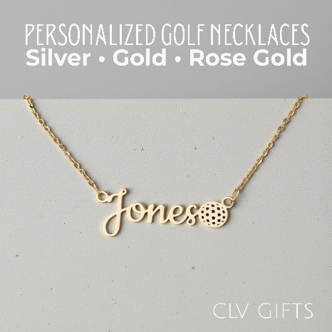 Gold-tone Jones name necklace with a golf ball motif on a pale neutral background.