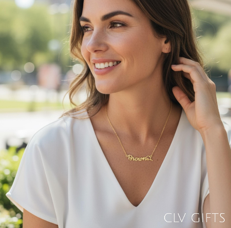Woman in a white blouse wearing a personalized tennis necklace outdoors.
