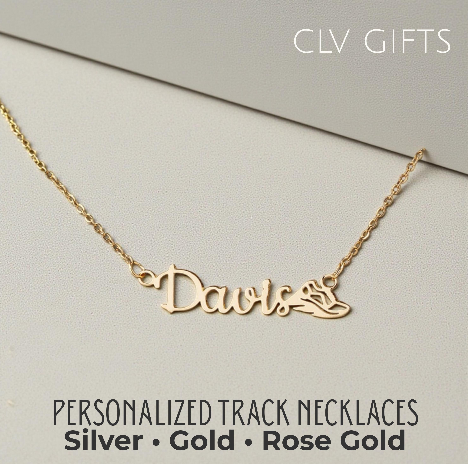 Gold-tone Davis name necklace with a running shoe motif on a pale neutral background.